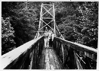Only remnants of this bridge remain; it was built by Lee Cunningham to span the river where it divided his property